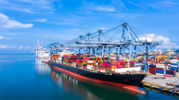 Container ship arriving in commercial port. Premium Photo