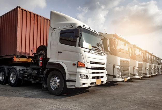 Trucks parked lined up Premium Photo